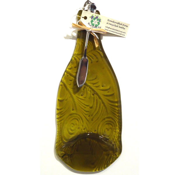 Gold glass cheese platter embossed with feather design, made from a recycled wine bottle available at Cerulean Arts.  