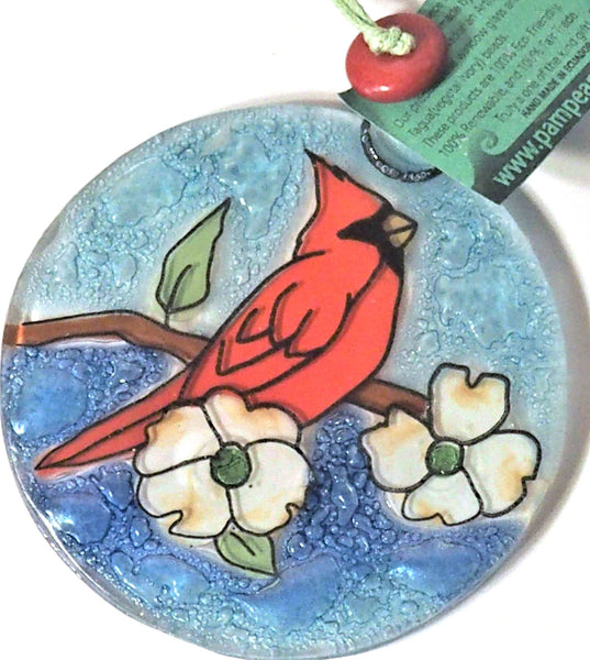 Fused glass suncatcher featuring a cardinal on a dogwood branch available at Cerulean Arts.  