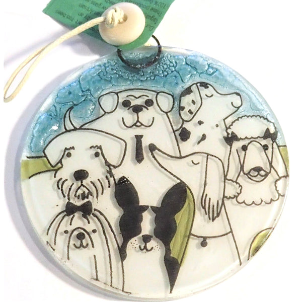 Fused glass suncatcher featuring a pack of dogs available at Cerulean Arts.  