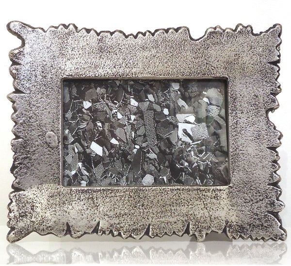 Picture frame made from recycled aluminum with irregular, free-form edges